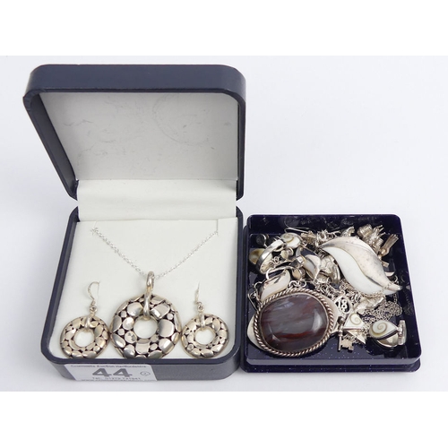 44 - Various items of silver jewellery, including a matching pendant and earrings set and a charm bracele... 