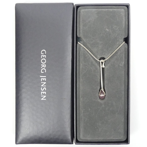 52 - A boxed Georg Jensen silver and rose quartz pendant and chain, 5.1 grams, pendant 45mm, chain 46cm.