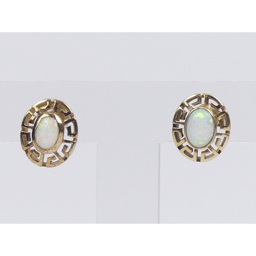 58 - A pair of 9ct gold opal set earrings, 3.5 grams, 12.9mm x 10.8mm.