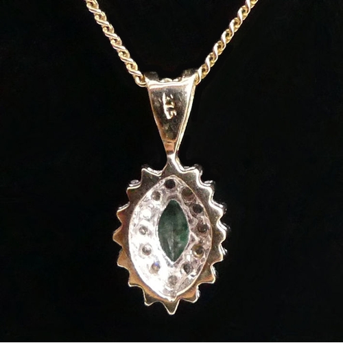 7 - Fine 9ct gold emerald and diamond pendant and chain, 2.9 grams, pendant 18mm, chain 42cm.