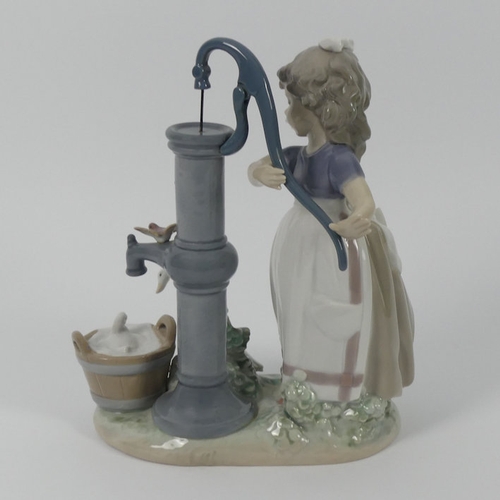 315 - A Lladro figure 5285 'Summer of the Farm', 24cm x 19cm.