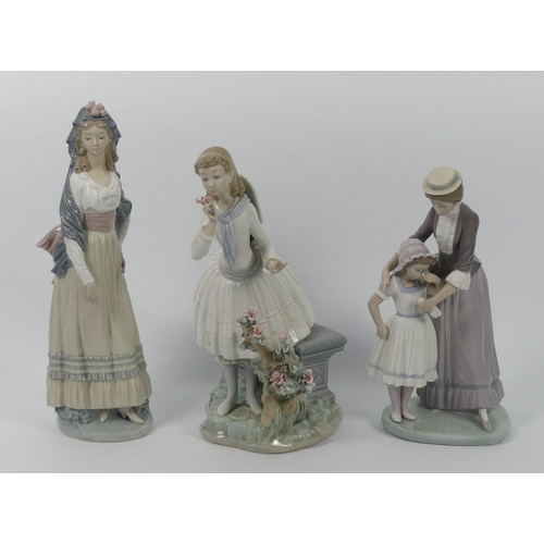 317 - Three Lladro figures, 5142 'Solace', 1313 