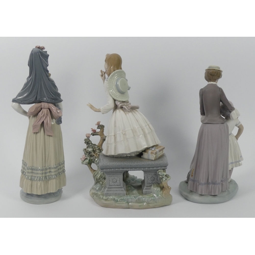 317 - Three Lladro figures, 5142 'Solace', 1313 