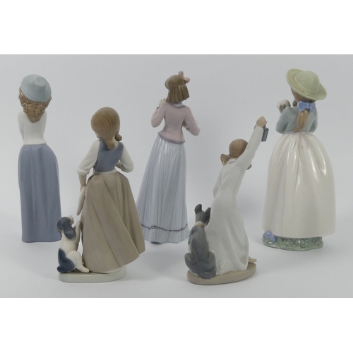 319 - Four Nao figures together with a Lladro figure 7644 