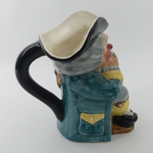 338 - A large Clarice Cliff for Newport Pottery Toby Jug, marks to base, 22 cm.