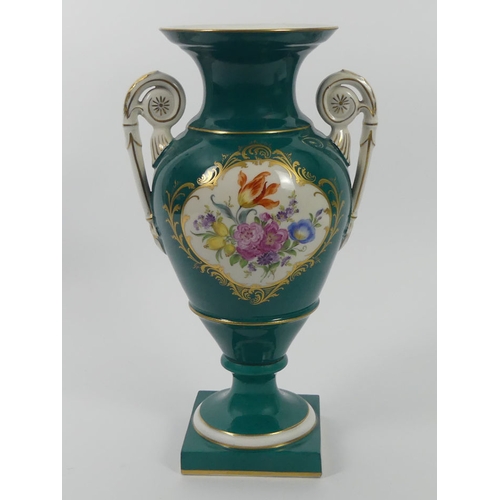 341 - A Meissen porcelain twin handled vase, the central cartouche with gilt and floral designs, cross swo... 