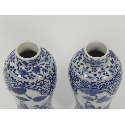 342 - A pair of 19th century Chinese, blue and white vases, marks to base, 19cm.