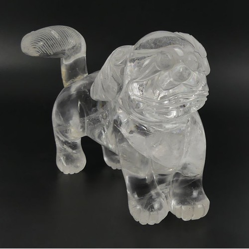 313 - A Chinese rock crystal figure of a dog, 19cm x 12cm.