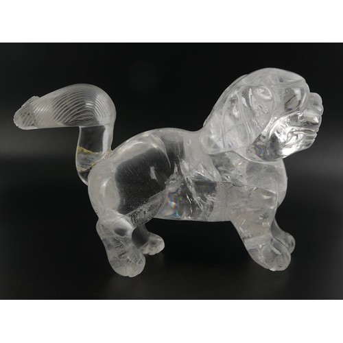 313 - A Chinese rock crystal figure of a dog, 19cm x 12cm.