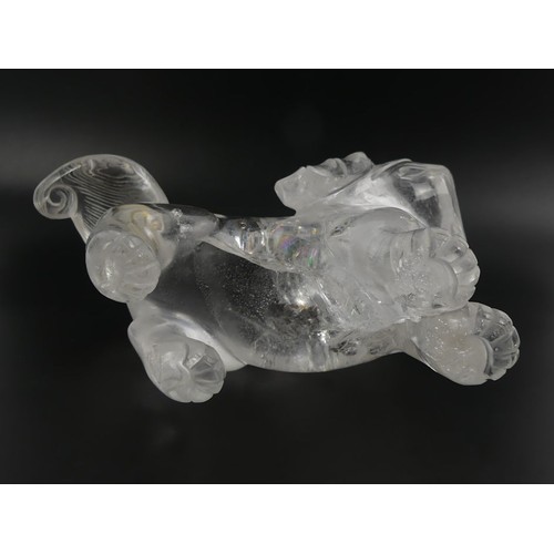 313 - A Chinese rock crystal figure of a dog, 19cm x 12cm.