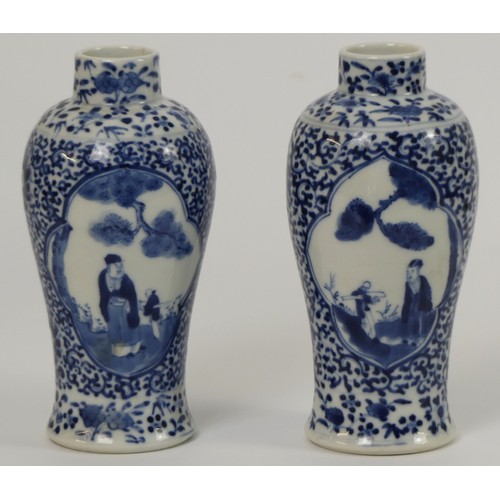 342 - A pair of 19th century Chinese, blue and white vases, marks to base, 19cm.