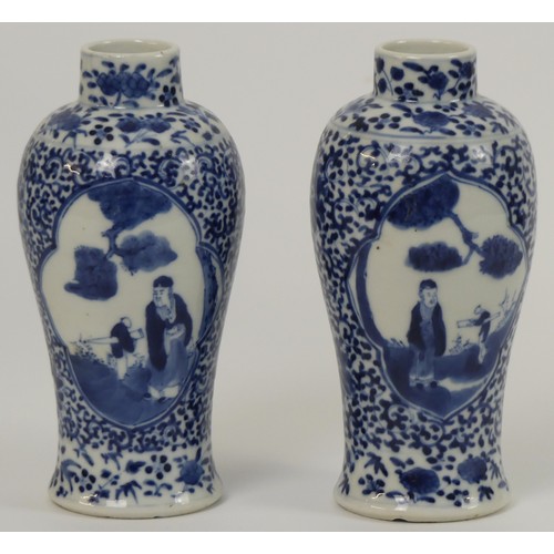 342 - A pair of 19th century Chinese, blue and white vases, marks to base, 19cm.