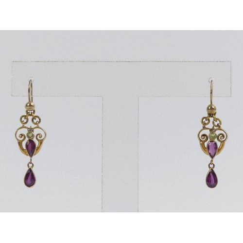 99F - A pair of gold, garnet,  peridot and seed pearl drop earrings, 2.2 grams, 33mm long excluding wire.