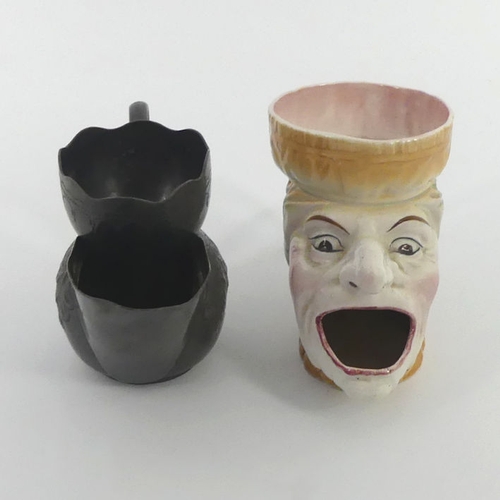 314 - Ceramic shaving mug in the form of Judy (Punch & Judy), together with a C.1900 pewter shaving mug, l... 