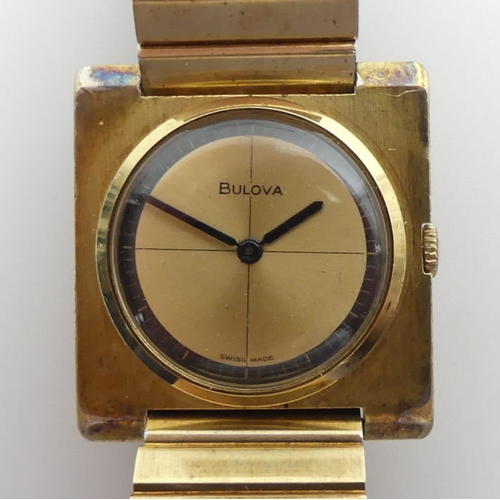 102 - A vintage gold tone Bulova gents, manual wind movement watch, 30mm sq.
Condition Report: In working ... 