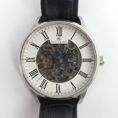 105 - A gents Accurist 7701 automatic, 24 jewel skeleton dial, stainless steel watch on a black leather st... 