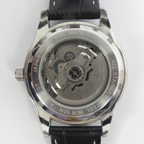 105 - A gents Accurist 7701 automatic, 24 jewel skeleton dial, stainless steel watch on a black leather st... 