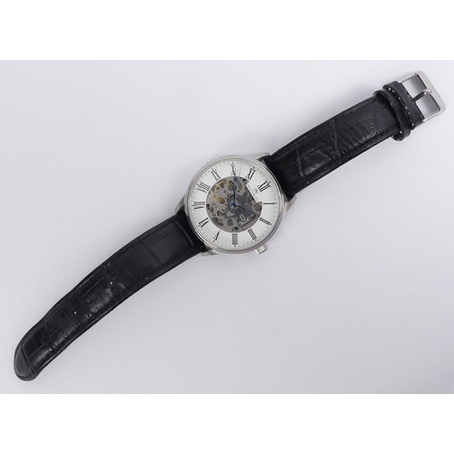 105 - A gents Accurist 7701 automatic, 24 jewel skeleton dial, stainless steel watch on a black leather st... 