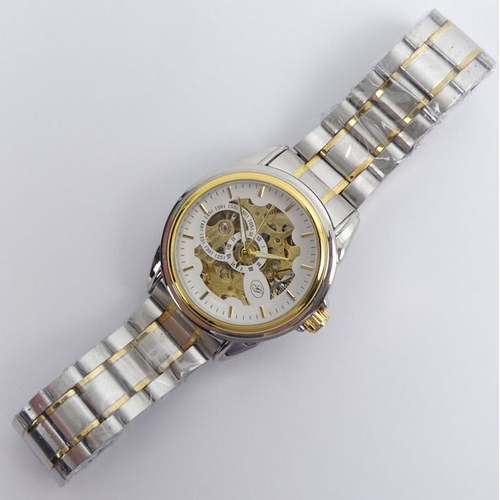 106 - A Genoa stainless steel two tone, automatic, skeleton dial watch, 42 mm wide.
Condition Report: In g... 