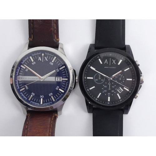 107 - Two Armani Exchange, gents quartz movement watches, one boxed, largest 48 mm wide.