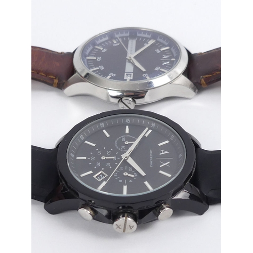 107 - Two Armani Exchange, gents quartz movement watches, one boxed, largest 48 mm wide.