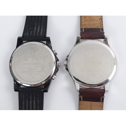 107 - Two Armani Exchange, gents quartz movement watches, one boxed, largest 48 mm wide.