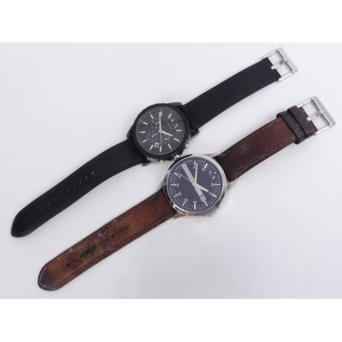 107 - Two Armani Exchange, gents quartz movement watches, one boxed, largest 48 mm wide.