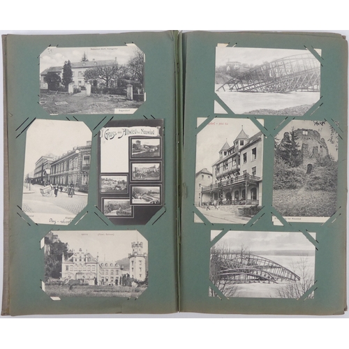An album of topographical postcards.