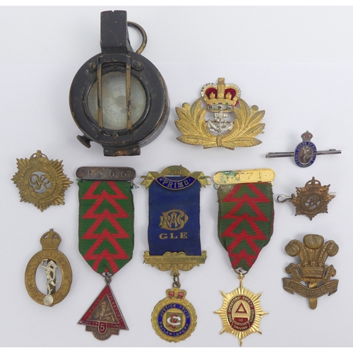 A MKIII 1943 marching compass, a Royal Navy Officer's cap badge, four ...