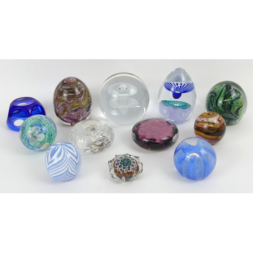 Twelve assorted glass paperweights including Caithness and Strathearn ...
