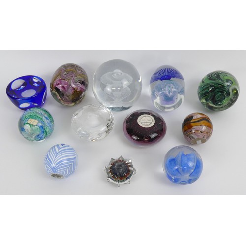Twelve assorted glass paperweights including Caithness and Strathearn ...