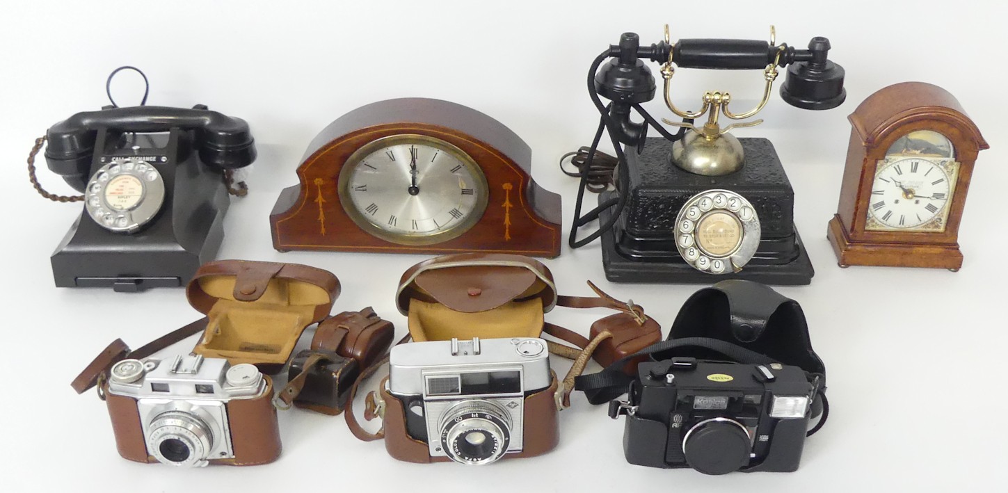 A collection of items, including a GPO bakelite telephone, three ...