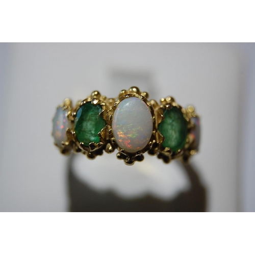 71 - 9ct. gold emerald and opal five stone ring - size L / M