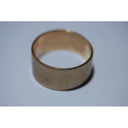 72 - 9ct. gold wide wedding ring - 3.8 g