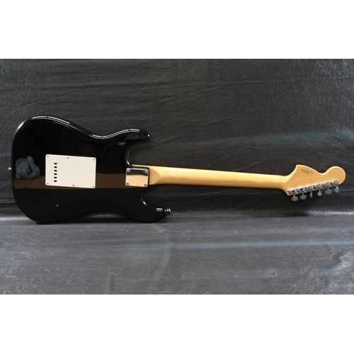 110 - Black Fender Squire Stratocaster purported to be signed by Cream (Ginger Baker signature faded from ... 