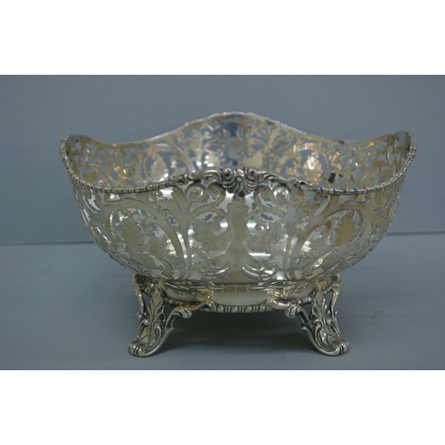 1 - Victorian pierced silver fruit bowl with foliate decoration, cotton reel borders on splayed feet. Lo... 