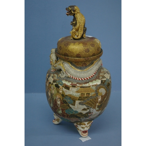 112 - Satsuma pottery pot pourri urn with lion dog finial and decoration of dragon entwined around pot, im... 