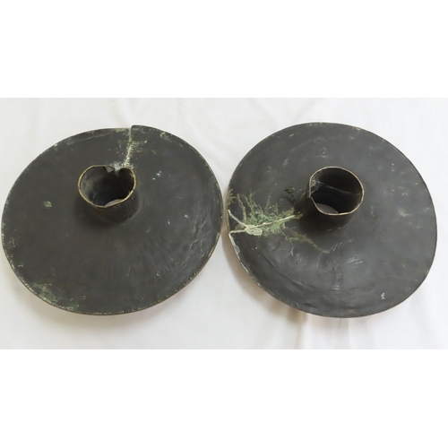 157 - Pair of African brass disc shaped mounts for poles with hammered geometric design decoration. Diam 1... 