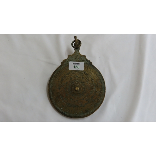 158 - Antique brass astrolabe with Arabic characters. Diam. 5.75 ins.