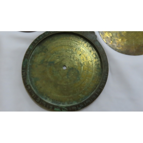 158 - Antique brass astrolabe with Arabic characters. Diam. 5.75 ins.