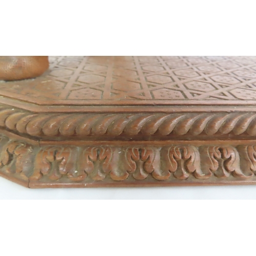 202 - An Anglo-Indian carved teak occasional table modelled as a camel, circa 1900. The octagonal top and ... 