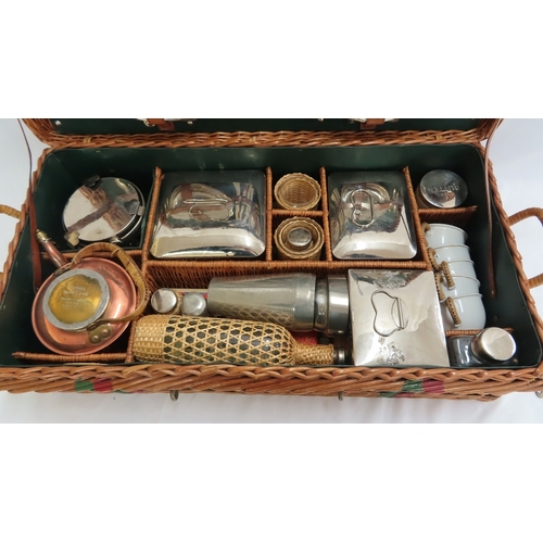 204 - An Edwardian picnic hamper for four persons complete with spirit stove, kettle, etc.