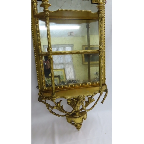 212 - 19thC gilt mirrored what-not with three shelves and decoration of urn, swags, vase of flowers, bead ... 