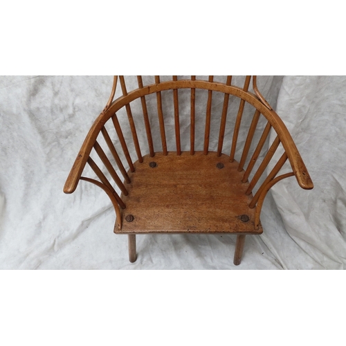 217 - 19thC ash comb back Windsor chair with shaped top rail, wrap around arms solid seat on turned legs. ... 