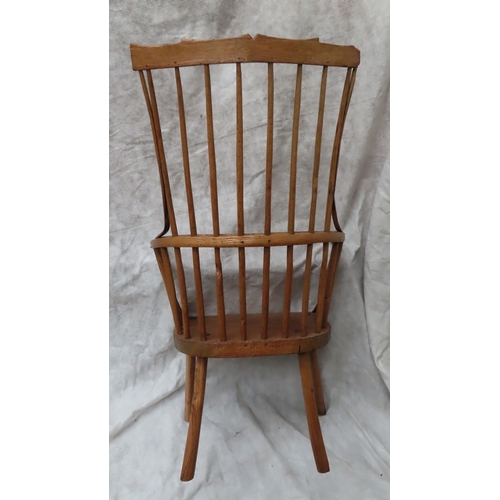 217 - 19thC ash comb back Windsor chair with shaped top rail, wrap around arms solid seat on turned legs. ... 