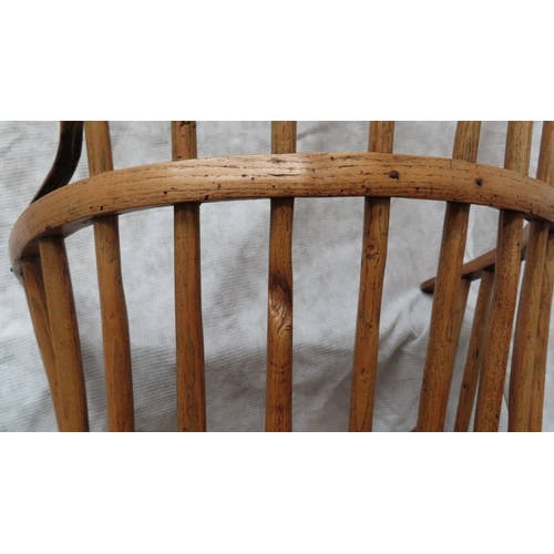 217 - 19thC ash comb back Windsor chair with shaped top rail, wrap around arms solid seat on turned legs. ... 