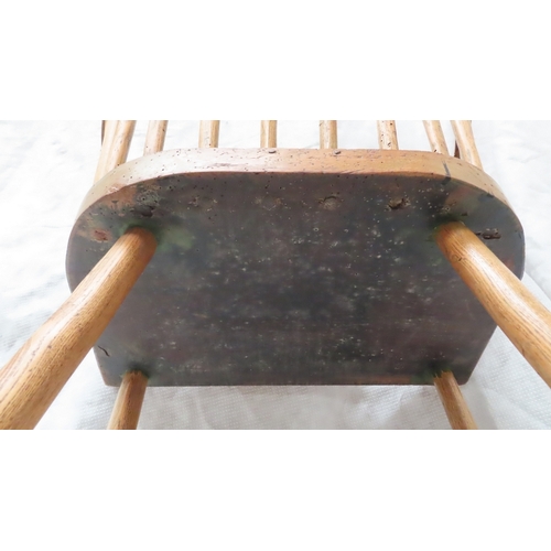 217 - 19thC ash comb back Windsor chair with shaped top rail, wrap around arms solid seat on turned legs. ... 