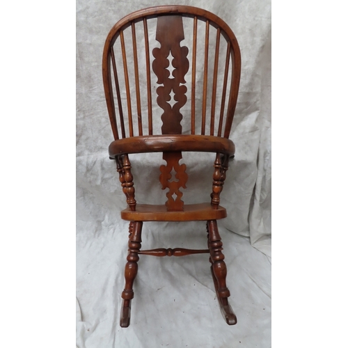 220 - Good quality Victorian yew wood comb back Windsor rocking chair matching lot 219. Ht. 42 ins., width... 