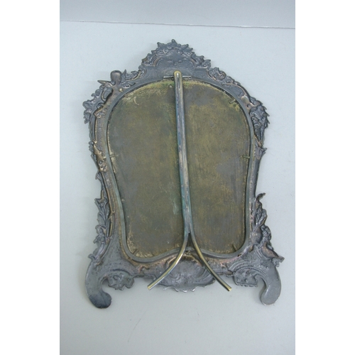 23 - Edwardian silver plate on copper, bevel glass dressing table mirror with decoration of cherubs, swag... 