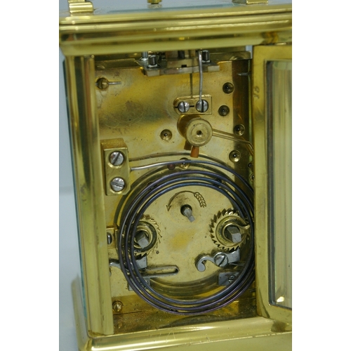 25 - French Brass four glass repeater carriage clock striking on the half. Ht. 5 ins.